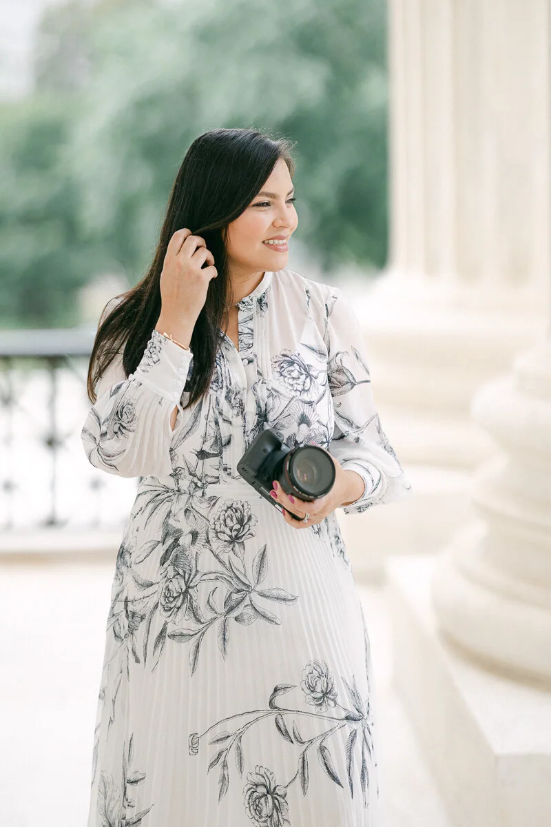 Barbara Gomez holding a camera