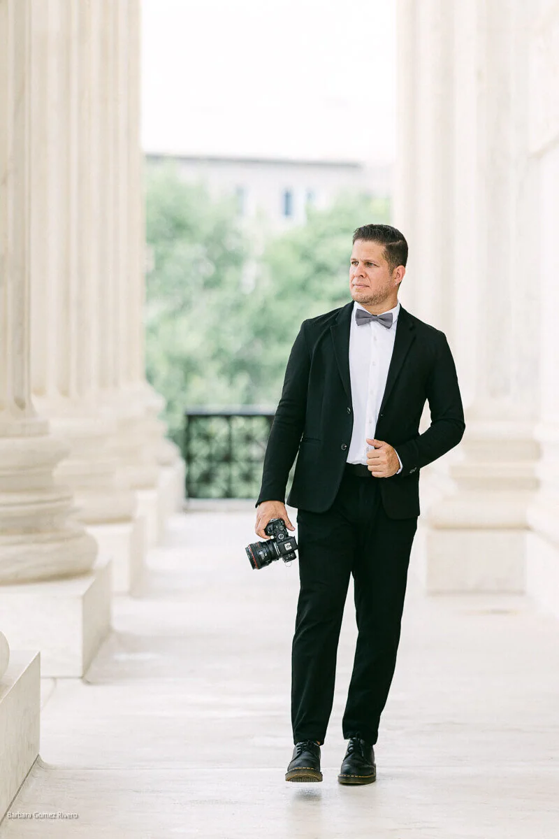 Luis Rivas holding a camera