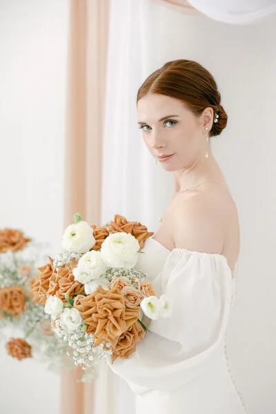 Bride with a white floral bouquet